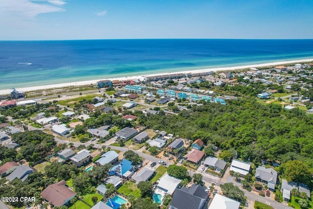 bird's eye view with a water view and a view of the beach