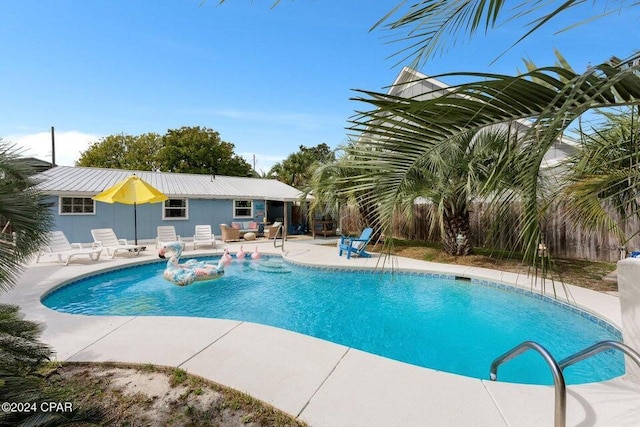 view of pool featuring an outdoor hangout area and a patio area