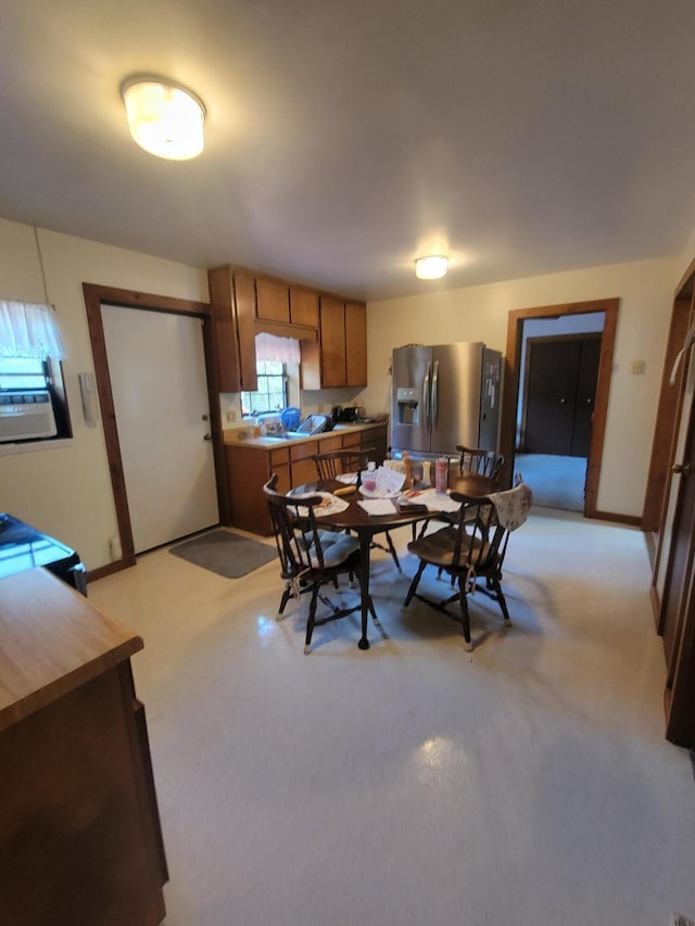 view of carpeted dining space