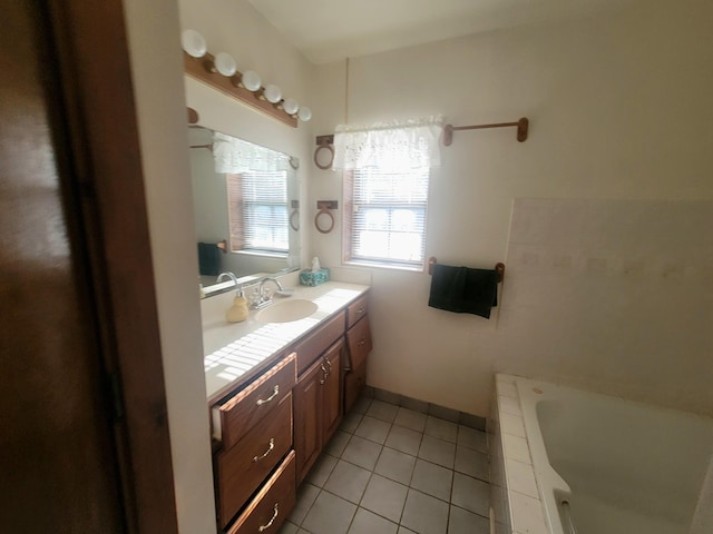 114 W May Lilly Ct, Defuniak Springs, FL 32433 - full bathroom featuring tile patterned flooring, a tub, and vanity