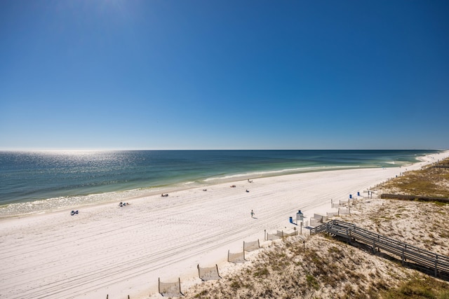 view of water feature with a beach view