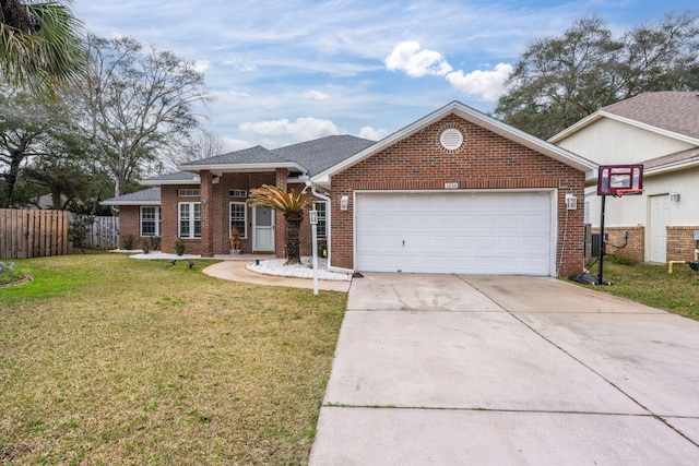 view of front of home with a front lawn and a garage