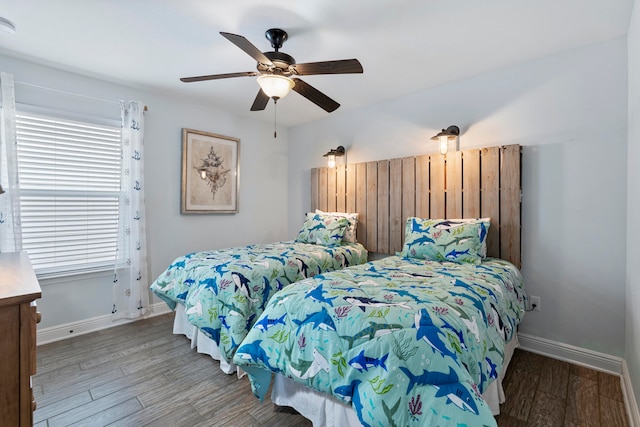 bedroom featuring ceiling fan and wood-type flooring