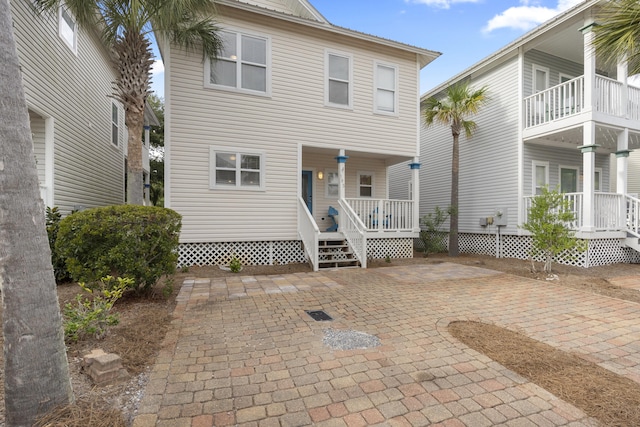 195 Emerald Dunes Cir, Santa Rosa Beach, FL 32459 - view of front facade featuring covered porch