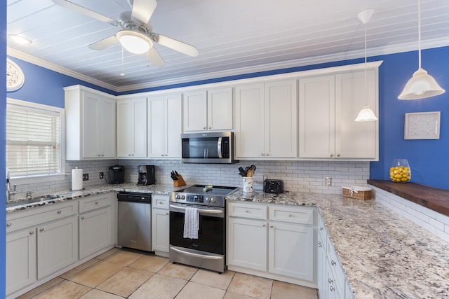 kitchen featuring white cabinetry, backsplash, crown molding, decorative light fixtures, and appliances with stainless steel finishes