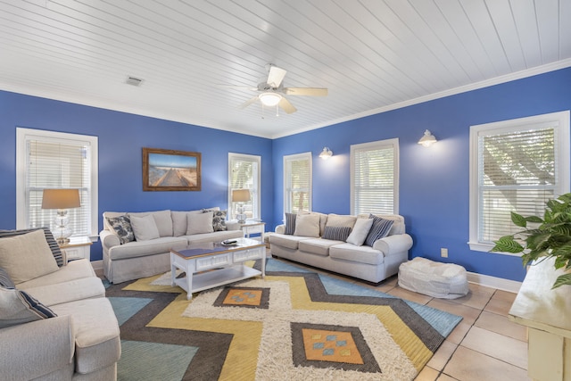195 Emerald Dunes Cir, Santa Rosa Beach, FL 32459 - living area with healthy amount of natural light, a ceiling fan, tile patterned floors, and ornamental molding