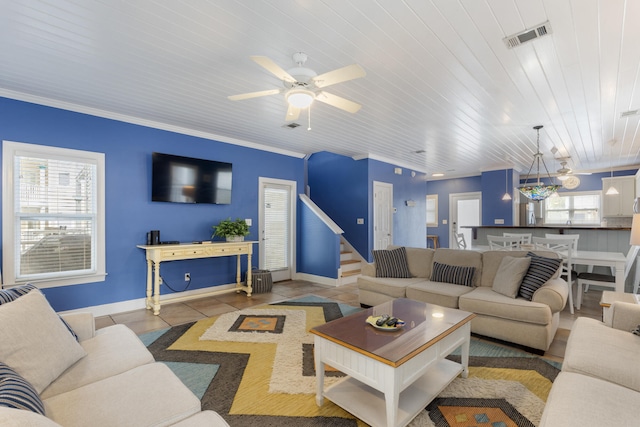 195 Emerald Dunes Cir, Santa Rosa Beach, FL 32459 - tiled living room featuring a ceiling fan, wooden ceiling, and stairs
