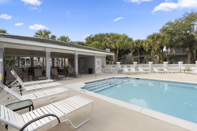 195 Emerald Dunes Cir, Santa Rosa Beach, FL 32459 - community pool featuring a patio area and a gate