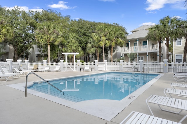 195 Emerald Dunes Cir, Santa Rosa Beach, FL 32459 - community pool with a patio area