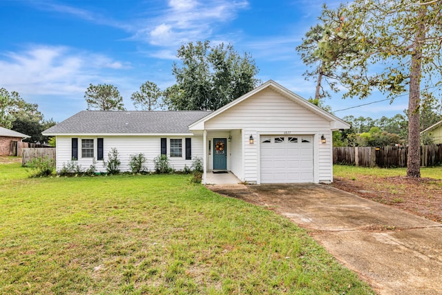 single story home featuring a front yard and a garage