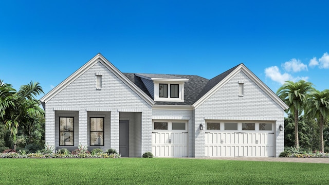 view of front facade with a front lawn and a garage