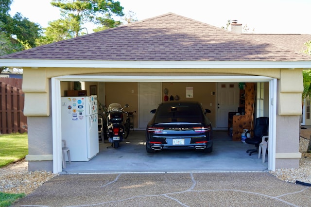 garage with white refrigerator