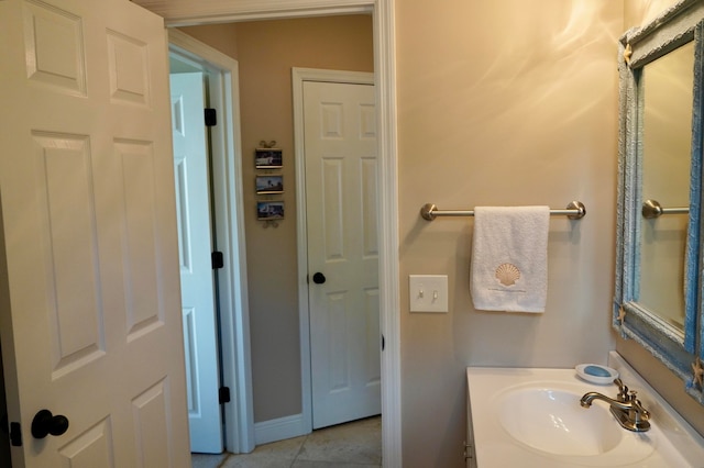 bathroom with vanity and tile patterned floors