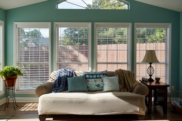 sunroom / solarium with plenty of natural light and vaulted ceiling