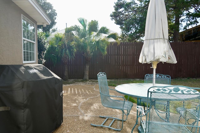 view of patio / terrace with a grill