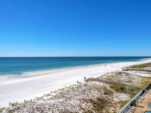 property view of water featuring a beach view