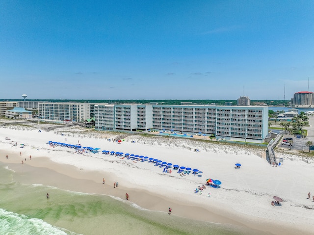 bird's eye view with a beach view and a water view