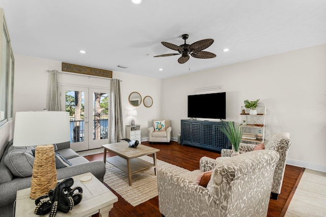 living room with ceiling fan, wood-type flooring, and french doors