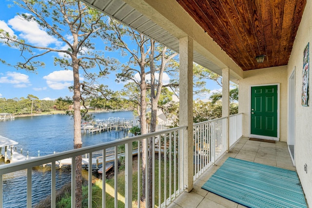 balcony featuring a water view