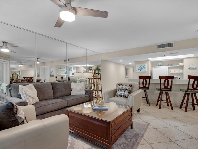 living room with ceiling fan