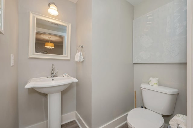 bathroom featuring toilet