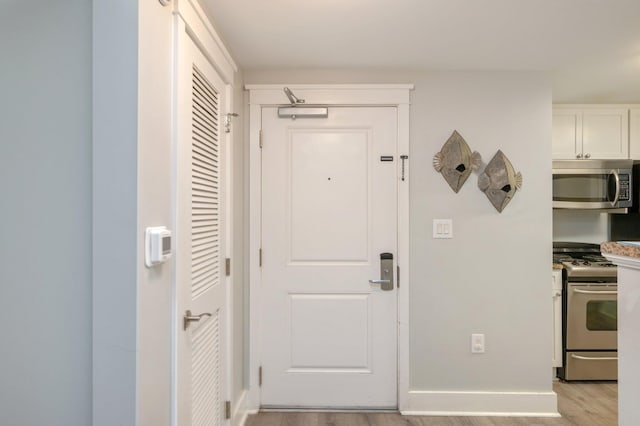 interior space with light hardwood / wood-style floors