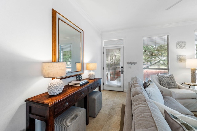 doorway to outside featuring ornamental molding