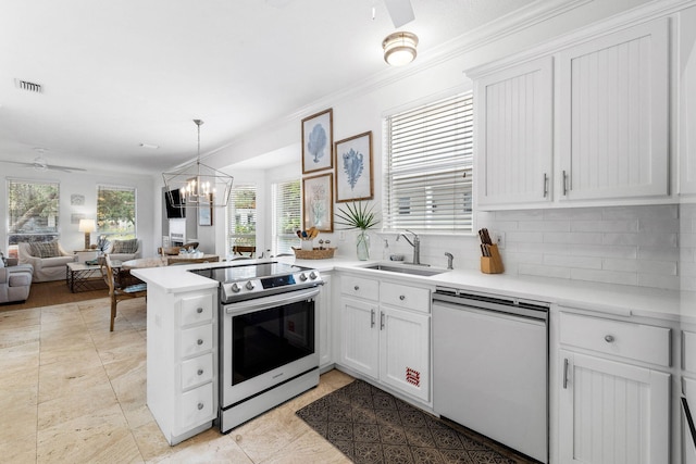 kitchen with dishwasher, sink, stainless steel electric range oven, decorative light fixtures, and white cabinetry