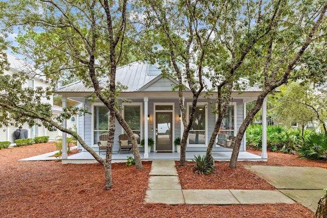 view of front of property featuring covered porch