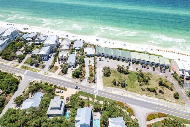 drone / aerial view with a view of the beach and a water view