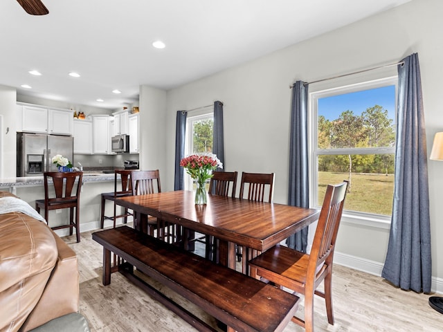 dining area featuring light hardwood / wood-style flooring