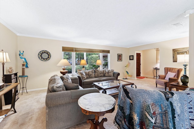 carpeted living room featuring ornamental molding