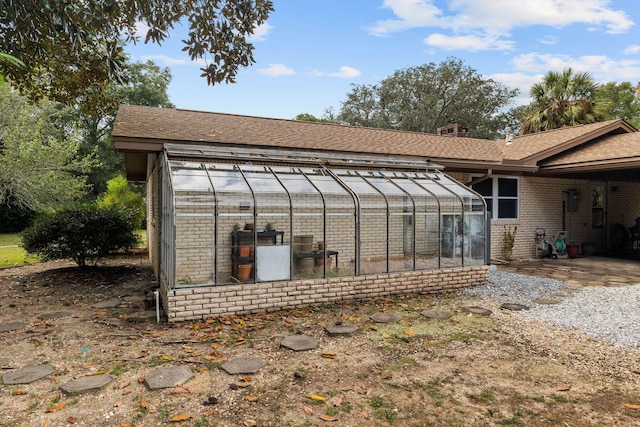 exterior space with an outbuilding