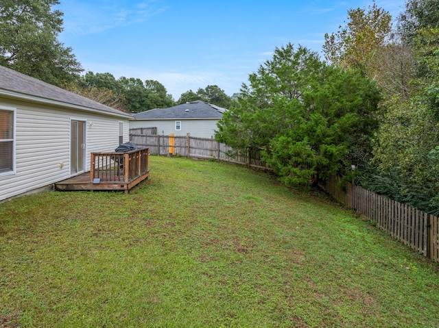 view of yard featuring a deck