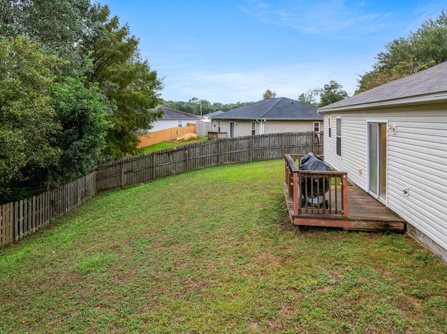 view of yard featuring a deck