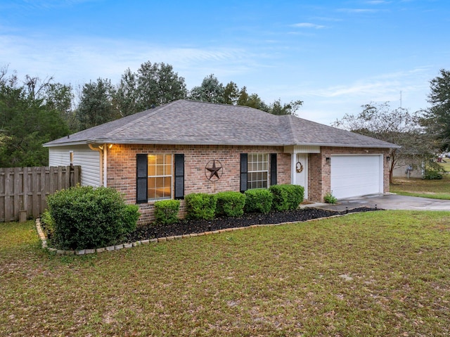 ranch-style home with a garage and a front lawn