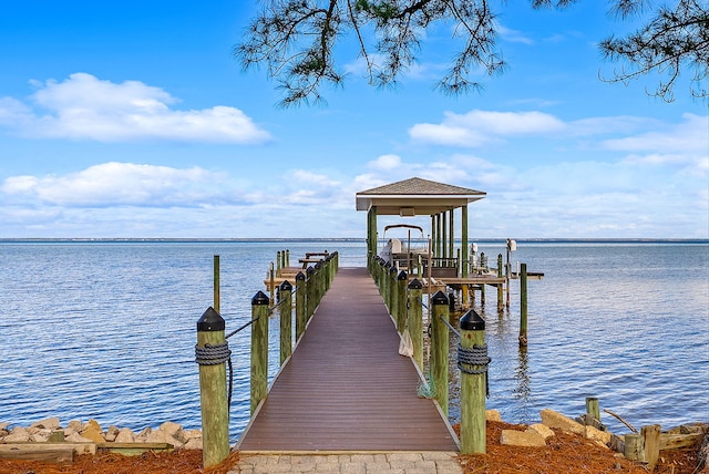 view of dock featuring a water view and boat lift