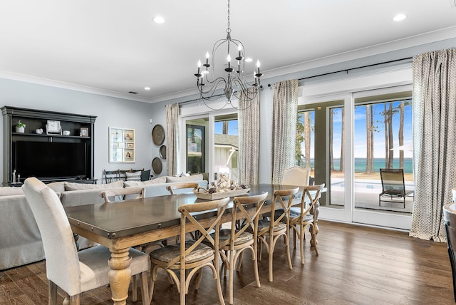 dining room with ornamental molding, recessed lighting, a notable chandelier, and dark wood finished floors