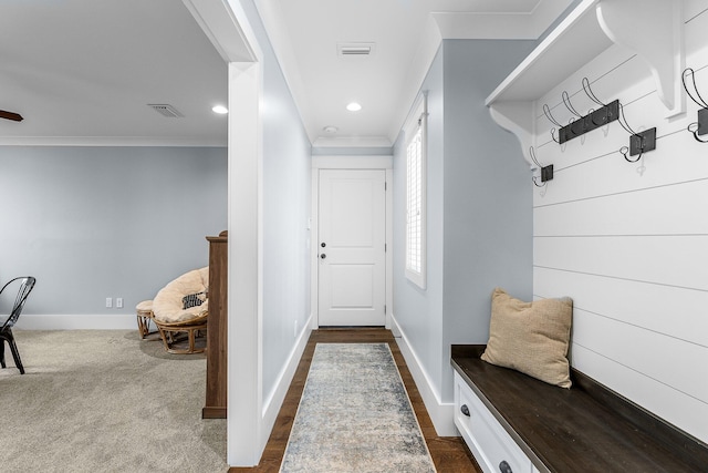 mudroom featuring crown molding, recessed lighting, dark colored carpet, visible vents, and baseboards