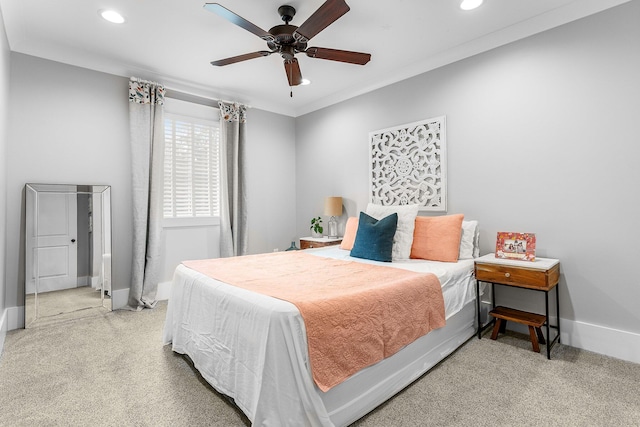 bedroom with carpet floors, recessed lighting, ornamental molding, ceiling fan, and baseboards