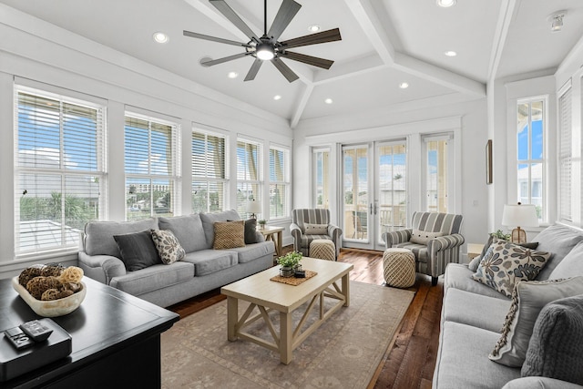 sunroom / solarium with lofted ceiling with beams, ceiling fan, and french doors