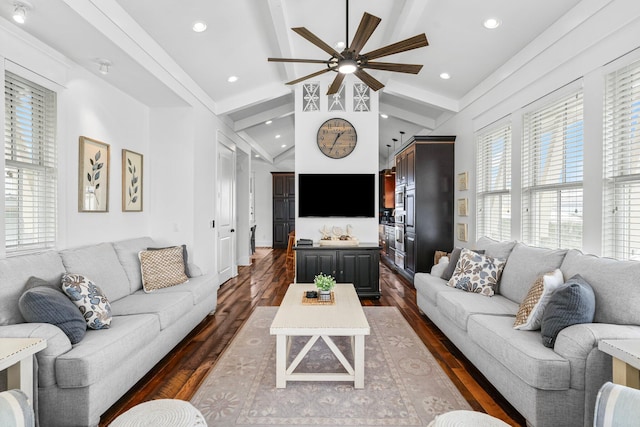 living room with ceiling fan, dark wood-type flooring, and lofted ceiling with beams