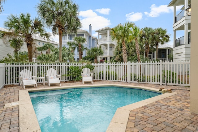 view of swimming pool featuring a patio