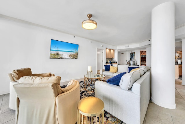 tiled living room with ornamental molding