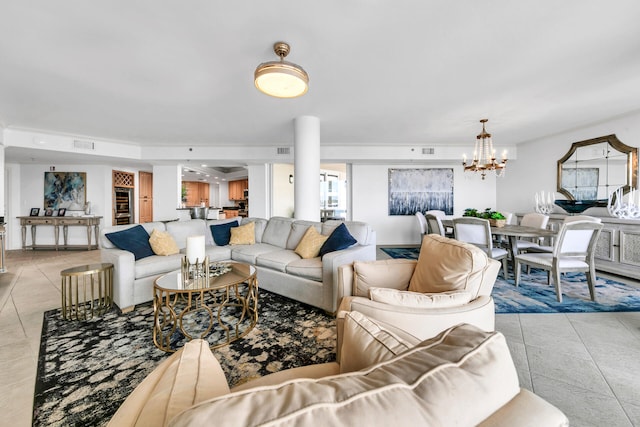 living room featuring an inviting chandelier