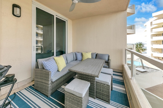 balcony featuring ceiling fan