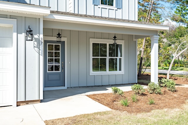 doorway to property featuring covered porch