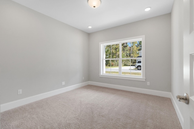 view of carpeted spare room