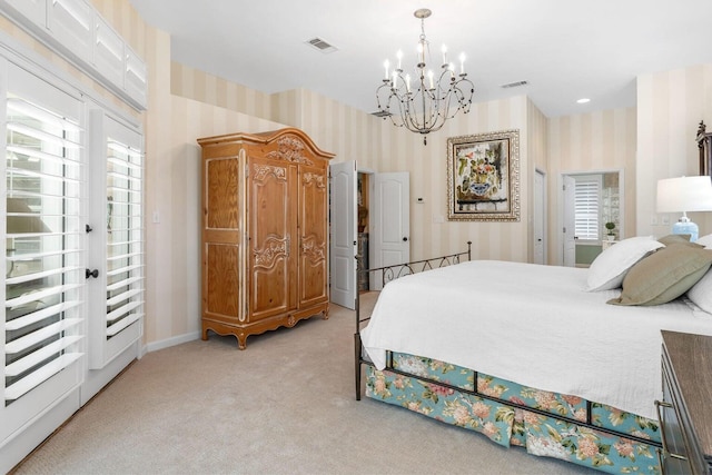 carpeted bedroom featuring multiple windows and a notable chandelier