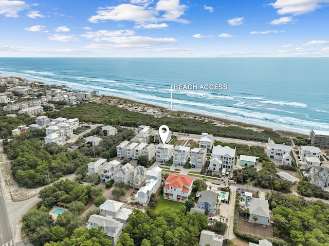 bird's eye view with a beach view and a water view